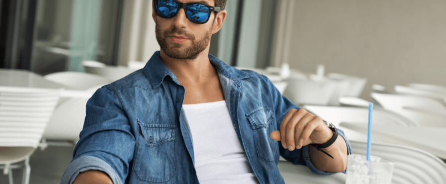 A man wears good quality sunglasses with UV protection